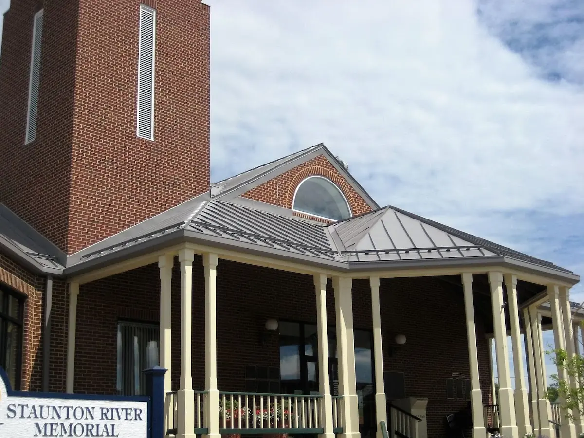 Skilled roofing craftsmen working on a residential roof in Hendersonville